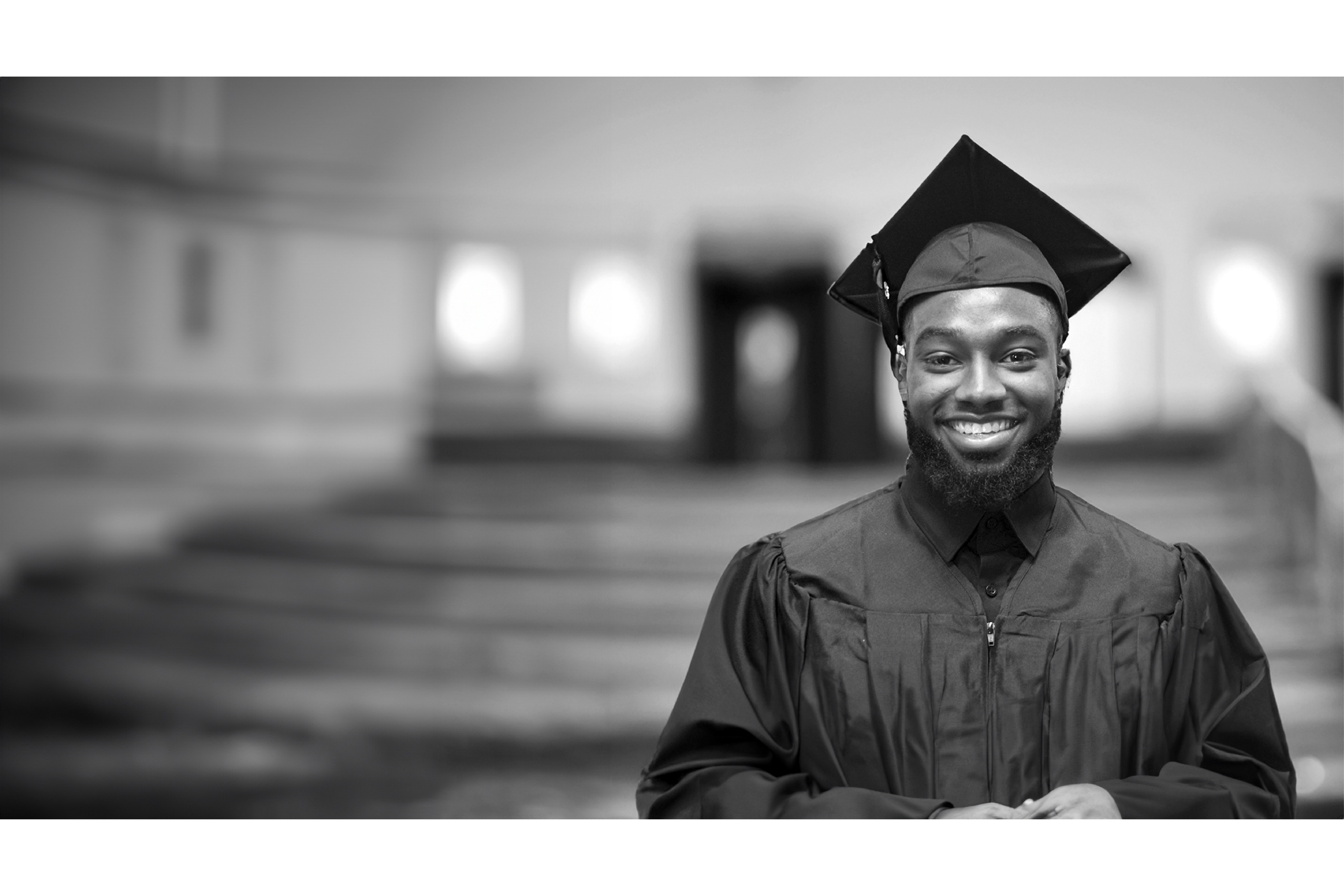Male Graduate smiling