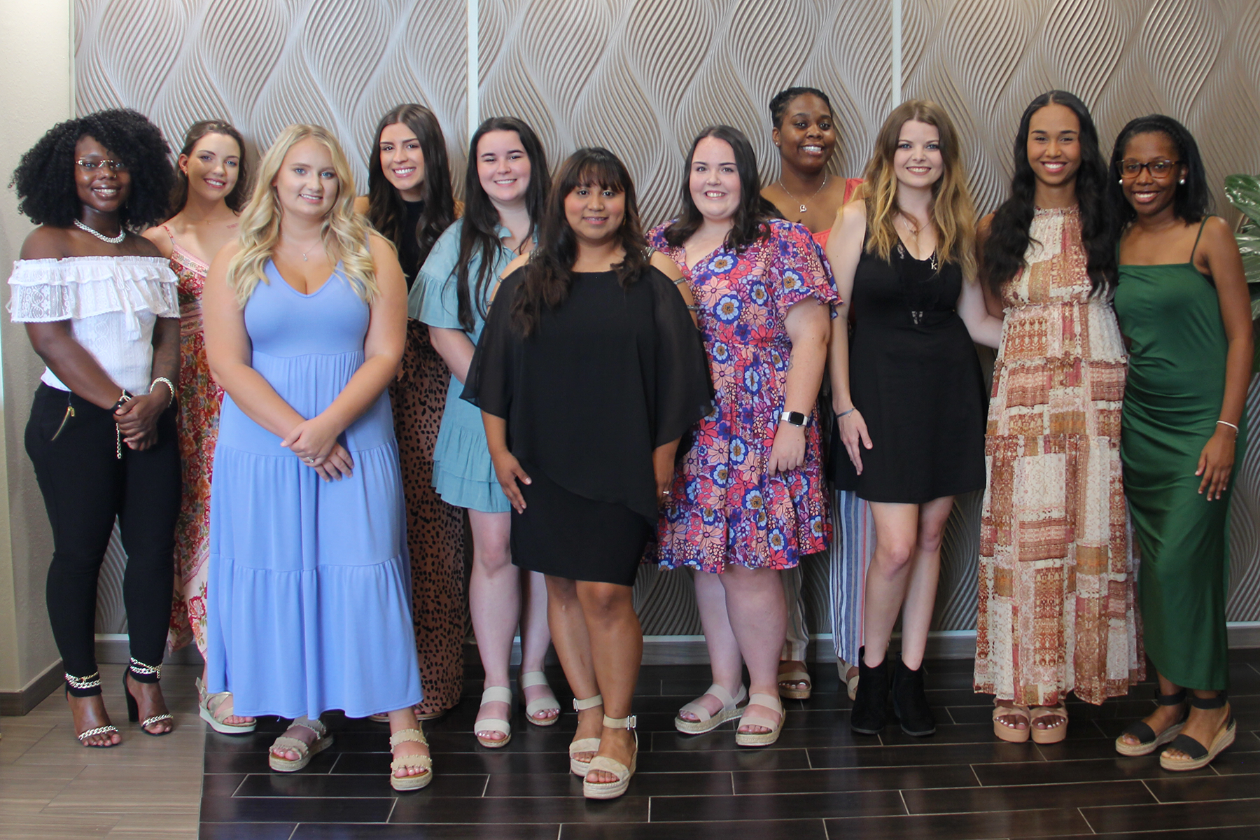 OTC Dental Assisting Students posing for a group photo at the 2023 July Pinning Ceremony