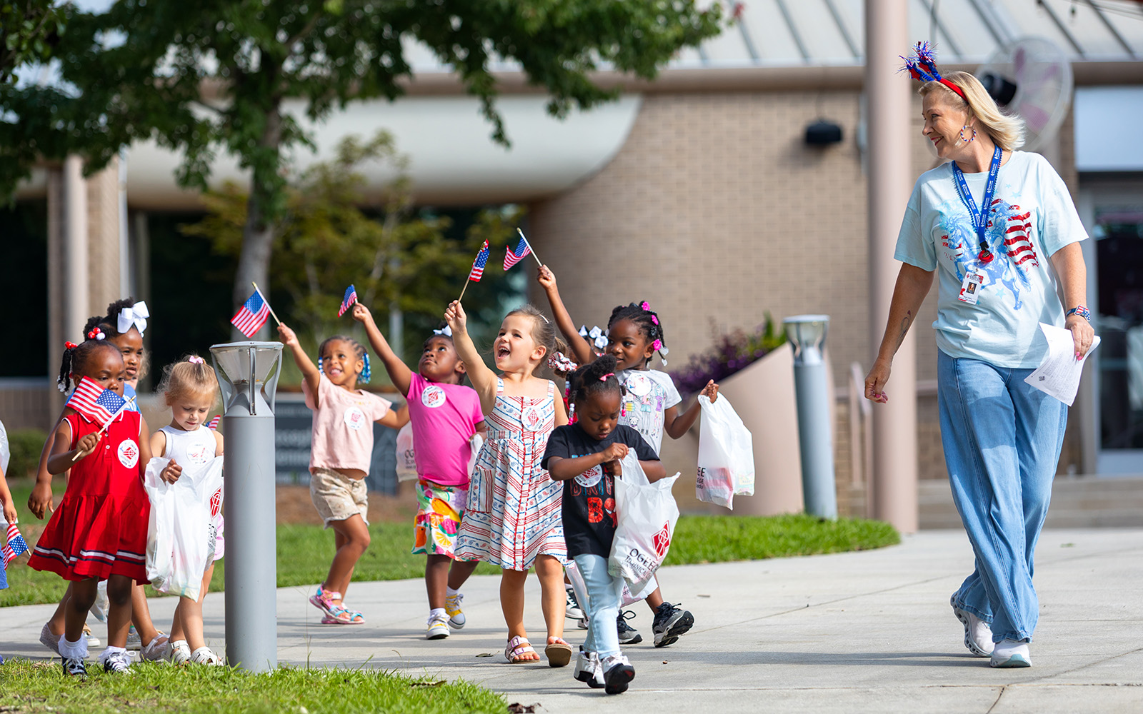 Early Childhood Care and Education Program hosts 4th of July Parade